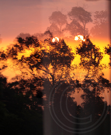 sunset reflection in window