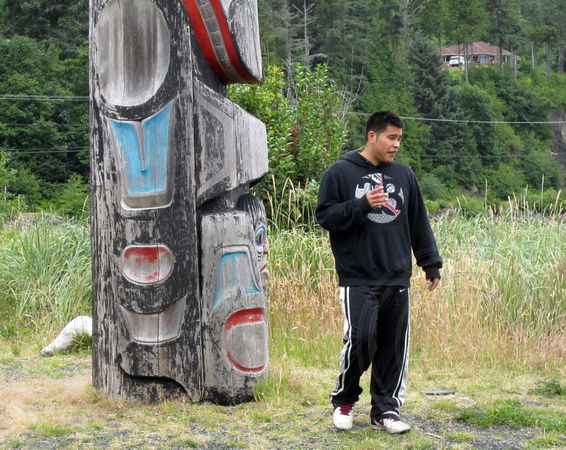 Jeff, the interpreter showing memorial totem pole